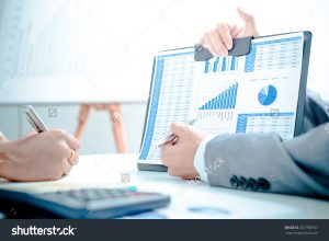 stock-photo-business-people-discussing-the-charts-and-graphs-showing-the-results-of-their-successful-teamwork-267798707